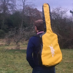 NERIS guitar waterproof drybag - on person's back